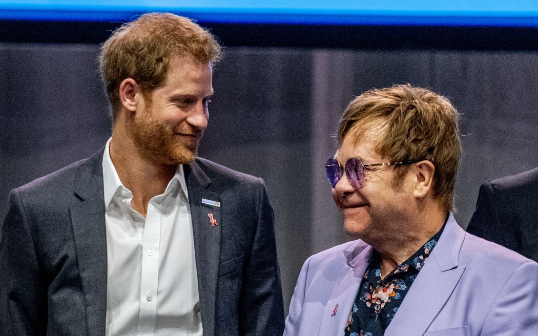 Prince Harry and Sir Elton John during a session about the Elton John Aids Fund on the second day of the International AIDS Conference 2018, in Amsterdam, The Netherlands, 24 July 2018.