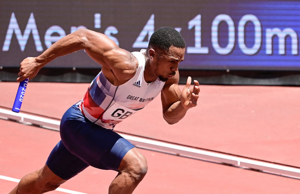 Britain's Chijindu Ujah competes in the men's 4x100m relay at the Tokyo Olympics.