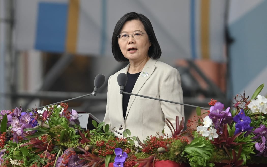 Taiwan's President Tsai Ing-wen speaks at a ceremony to mark the island's National Day in front of the Presidential Office in Taipei on October 10, 2022. (Photo by Sam Yeh / AFP)