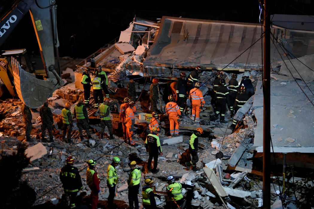 Italian search and rescue team search for six members of Lala family stuck under the rubble of a collapsed building in the town of Durres.