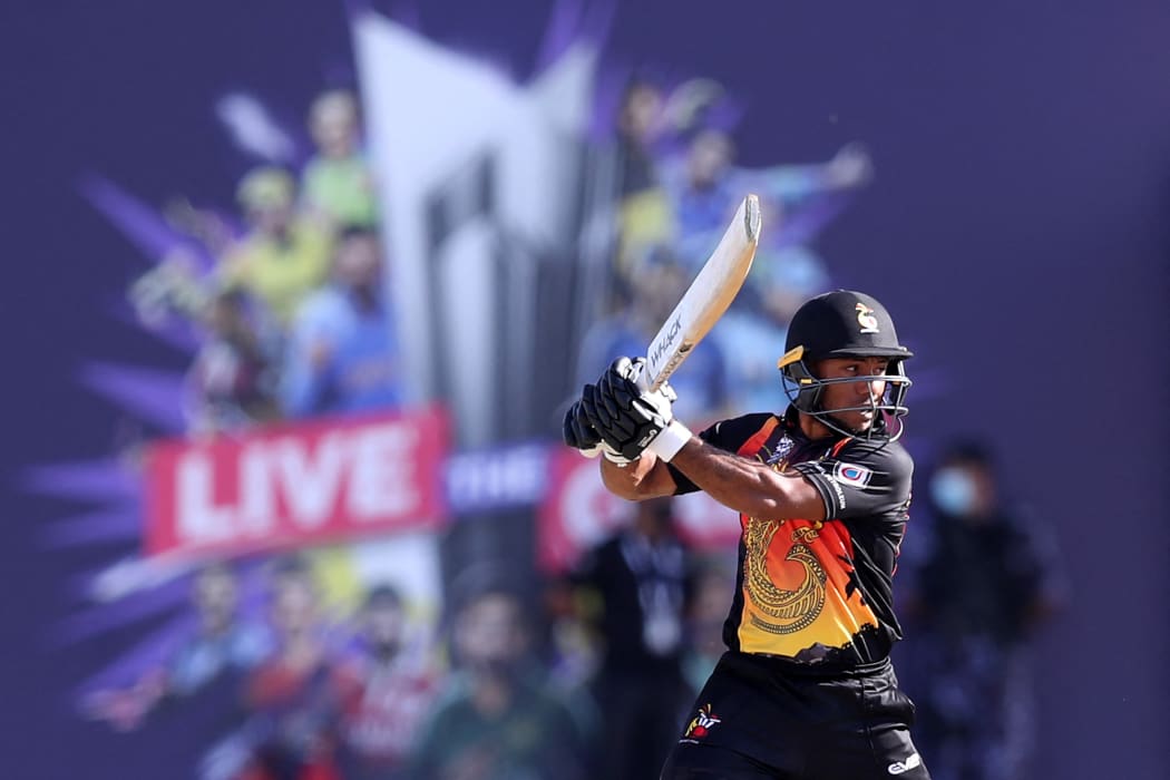Papua New Guinea captain Assad Vala plays a shot during the T20 World Cup match against Oman.