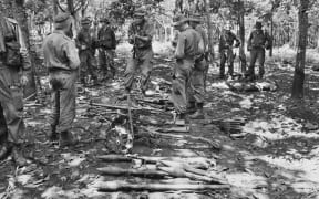 Australian troops with weapons at Long Tan in 1966