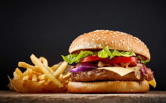 Burger with fries.