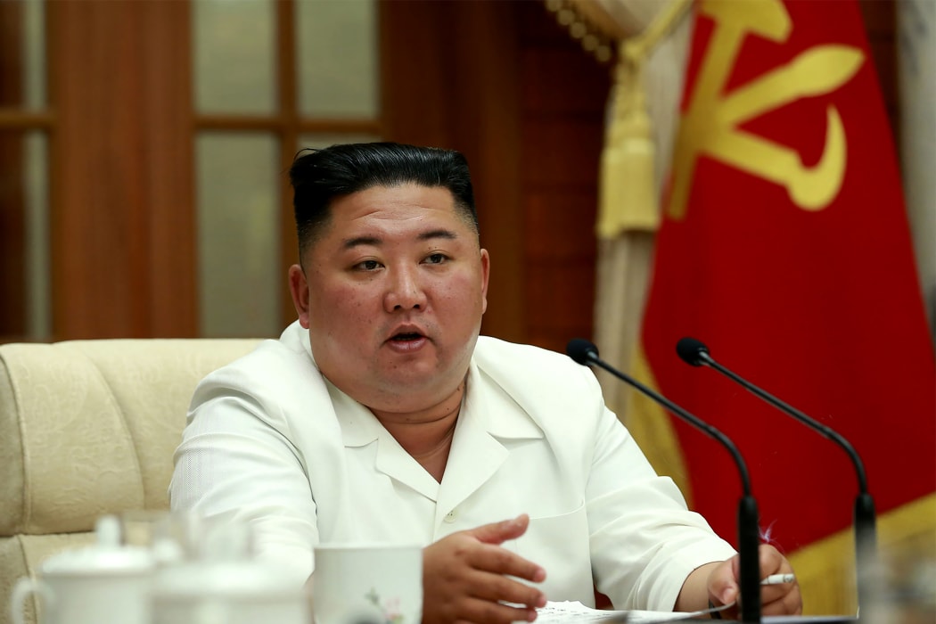 North Korean leader Kim Jong Un speaks during a meeting in Pyongyang on August 25, 2020.