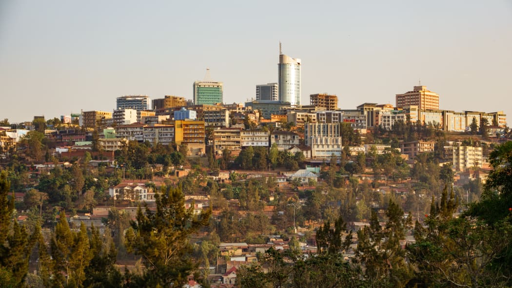 Central Kigali, the capital of Rwanda, mixes huts with modern buildings.