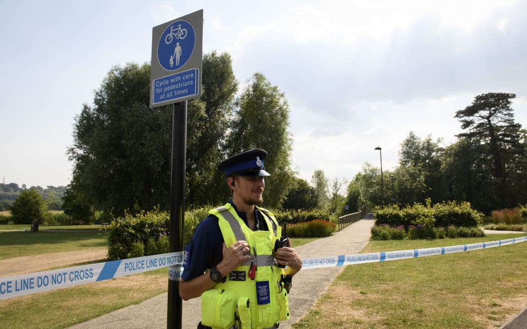 A police officer near the police line in Queen Elizabeth Gardens in Salisbury.