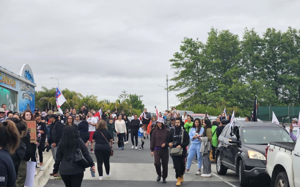 Demonstrators at the West Auckland suburb of Hobsonville.