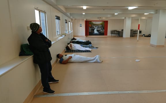 Some New Zealanders in Yongah Hill Detention Centre mess hall where they have been kept since riots.