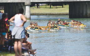 Horouta Club waka ama paddlers racing in Gisborne.