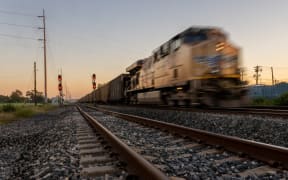 A freight train travels through Houston.