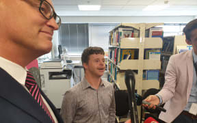 Tim Fairhill answers questions with Minister David Clark.