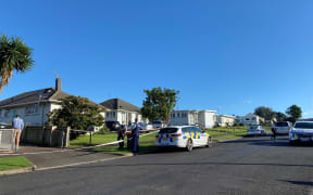 An RNZ reporter at the scene said police had put up a tent at the cordoned-off property and officers were wearing protective forensic clothing.