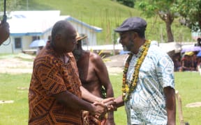 Current Vanuatu prime minister Israel Kalsakau, left, with former PM Charlot Salwai