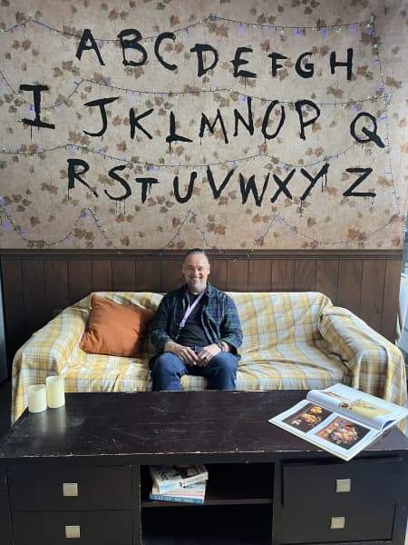 Spark's Tony Agar,  in front of the Stranger Things Christmas light wall. Spark is holding an exclusive watch party for 60 competition winners in downtown Auckland.