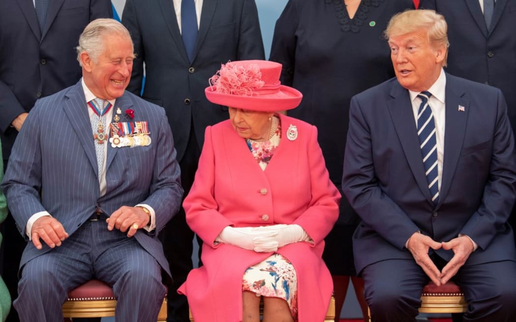 Britain's Prince Charles, Queen Elizabeth II and US President Donald Trump pose for the official family photograph during an event to commemorate the 75th anniversary of the D-Day landings, in Portsmouth.
