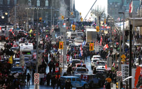 Supporters of the Freedom Convoy protest  Covid-19 vaccine mandates and restrictions on 29 January, 2022 in Ottawa, Canada.