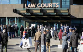 Counterspin supporters outside the Christchurch Courts building.