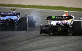New Zealand driver Liam Lawson of Racing Bulls (L) and Carlos Sainz of Williams crash during 2025 Dutch Grand Prix.