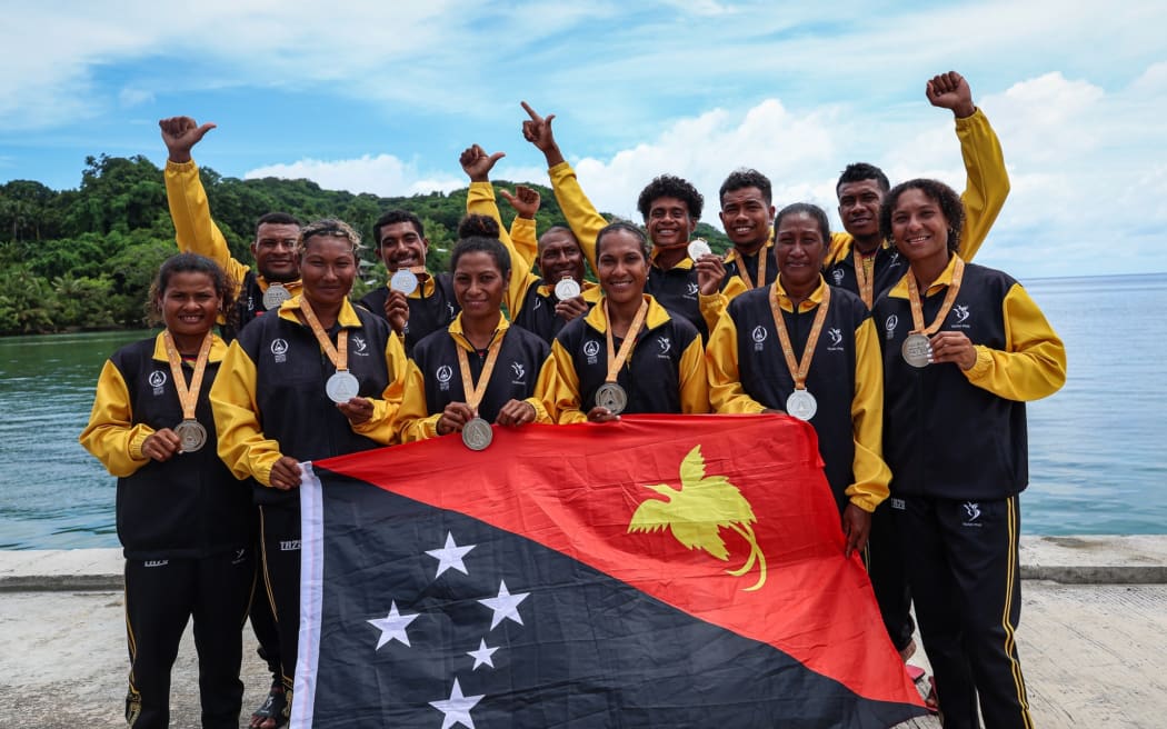 Team PNG paddlers with their spoils at the end of day one of competition. 30 June 2025