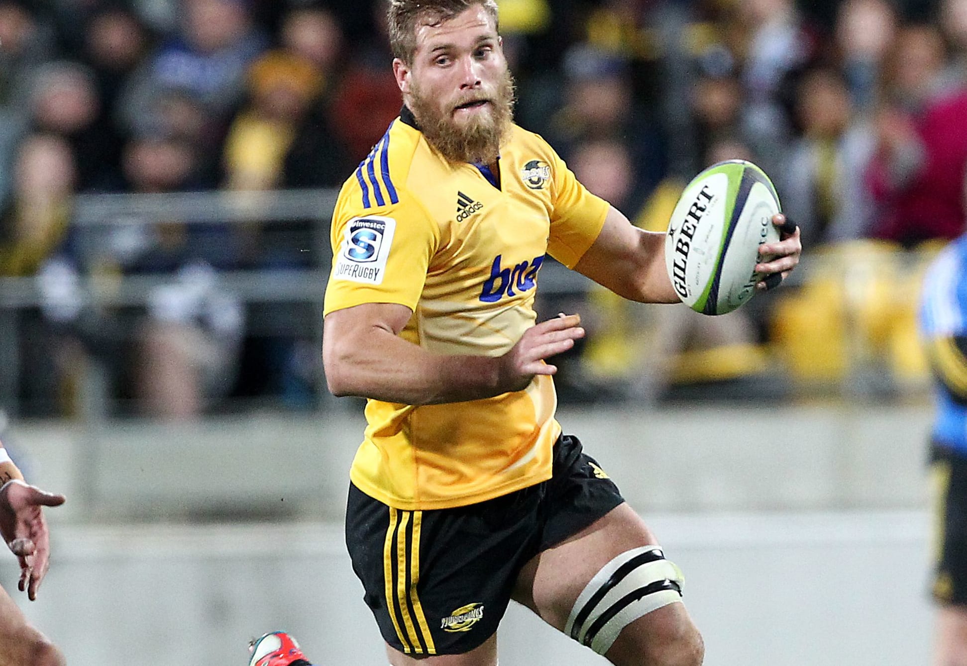 Hurricanes' Brad Shields carries the ball in one hand during the Super Rugby Semi Final, Hurricanes v Brumbies.