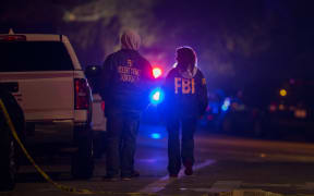 THOUSAND OAKS, CA - NOVEMBER 08: F.B.I. agents monitor the scene near the Borderline Bar and Grill, where a mass shooting occurred, on November 8, 2018 in Thousand Oaks, California.