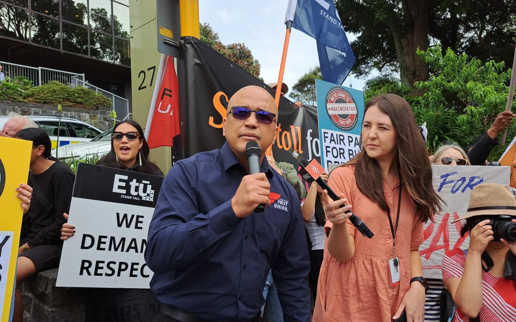 FIRST Union general secretary Dennis Maga speaking at a protest against scrapping Fair Pay Agreements outside the office of ACT leader David Seymour in the Auckland suburb of Epsom on 11 December 2023.