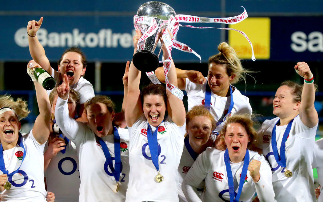 The England women's rugby team celebrates their Six Nations win earlier this year.