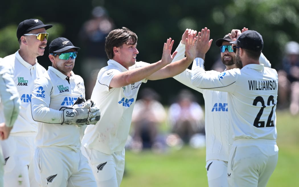 New Zealand bowler Zak Foulkes celebrates the wicket of West Indies batsman Tevin Imlach during the first test.