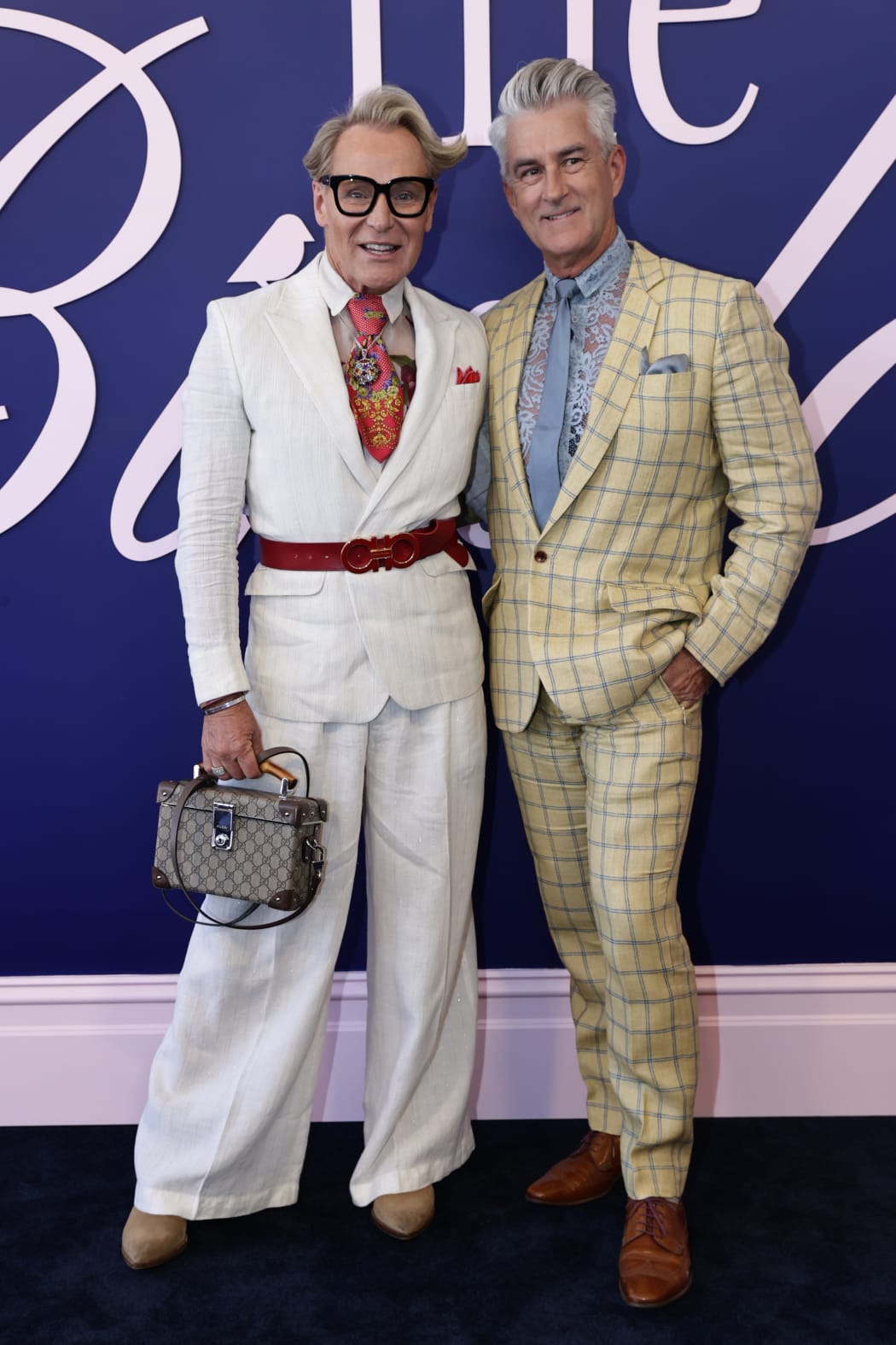 Mitch Edwards and Mark Mckie pose for a photo during 2024 Melbourne Cup Day at Flemington Racecourse on November 05, 2024 in Melbourne, Australia.
