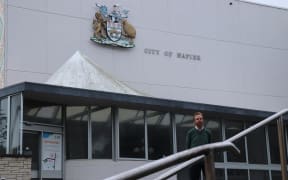 Napier City Council's acting director of community services Darran Gillies in the shadow of the old council chambers, which will start being demolished next month.