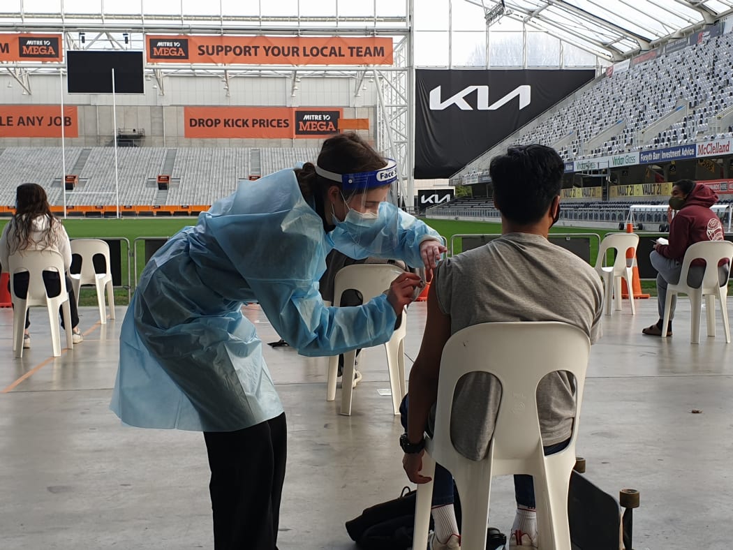 A person has a dose administered at the event.