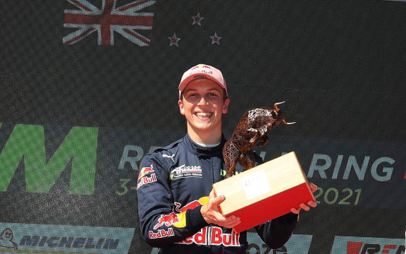 Liam Lawson holds the winners' trophy after winning race one of the DTM weekend at the Red Bull Ring at Spielberg in Austria on September 4th 2021.