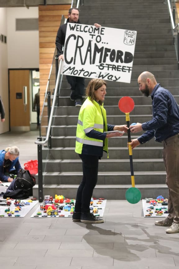 As councillors arrived in their offices this morning, they encountered a mock pedestrian crossing blocking their access to the stairs in protest over DEMP plans.
