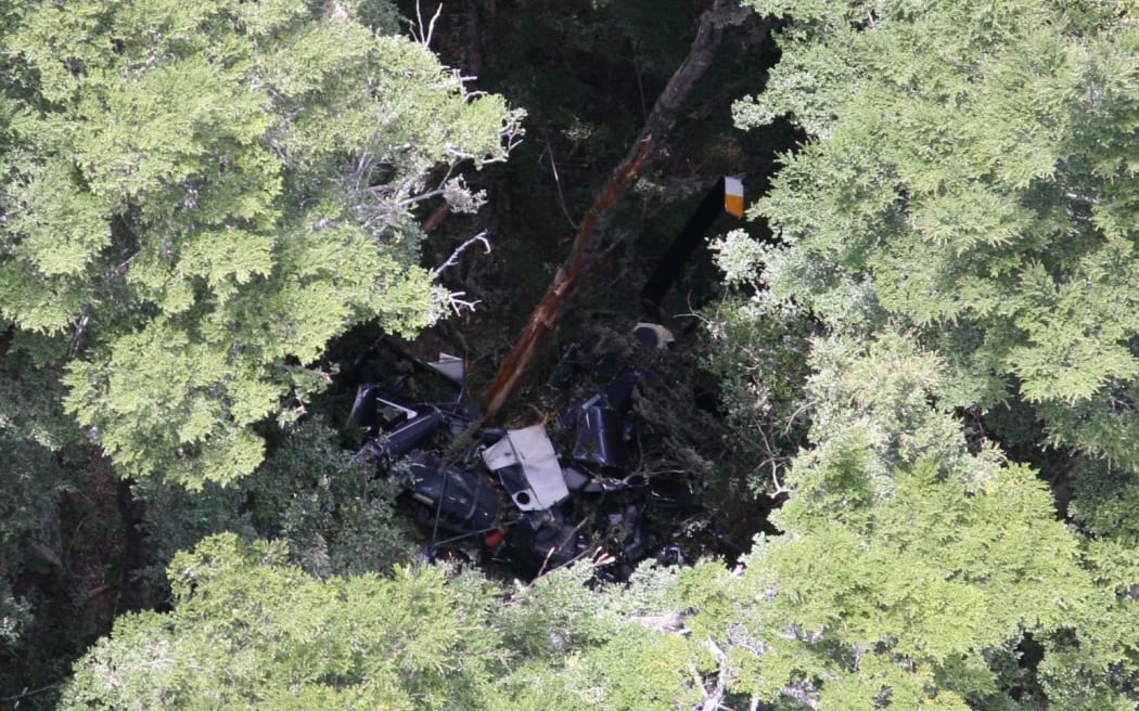 Wreckage of the Robinson 44 helicopter that crashed on Thursday in a valley near Queenstown.