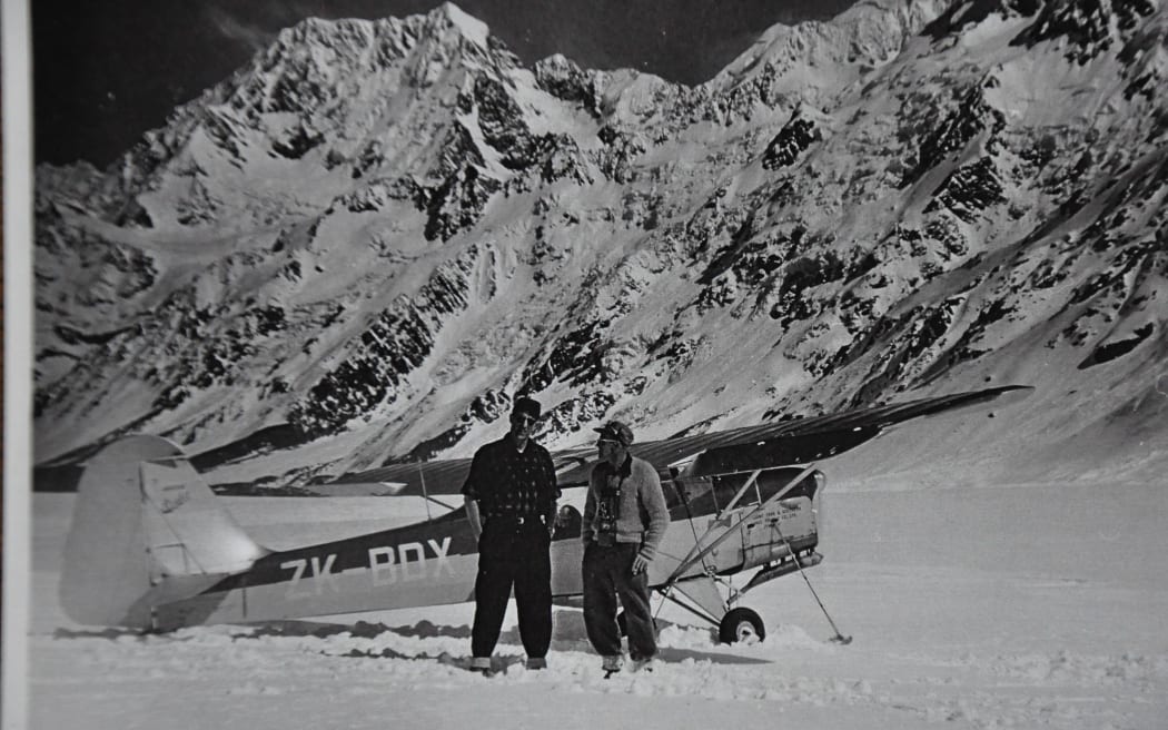 Sir Edmund Hillary (left) was one of the earliest passengers aboard Sir Harry Wigley’s first glacier flights on 22 September, 1955.