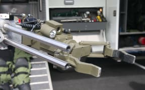 Military or police robot used to safely move or detonate bombs and mines