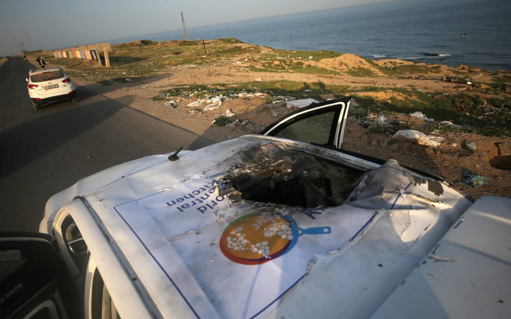 A view of the destroyed roof of a vehicle where employees from the World Central Kitchen (WCK), including foreigners, were killed in an Israeli airstrike, according to the NGO as the Israeli military said it was conducting a thorough review at the highest levels to understand the circumstances of this "tragic" incident, amid the ongoing conflict between Israel and Hamas, in Deir Al-Balah, in the central Gaza, Strip April 2, 2024. (Photo by Yasser Qudihe / Middle East Images / Middle East Images via AFP)
