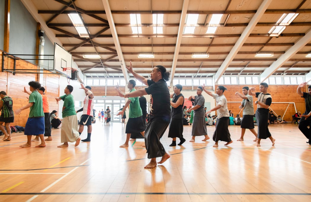 Seteone Tuli leads practice with the boys at Aorere College as they prepare for Polyfest.