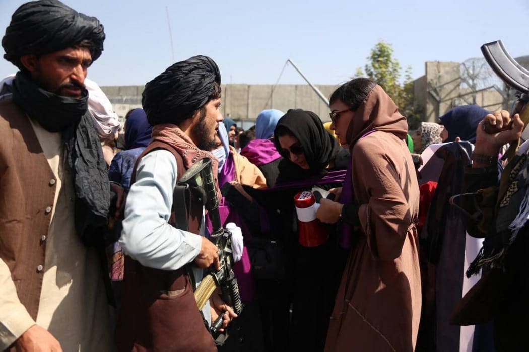 Taliban clash with women's rights protesters in Kabul.