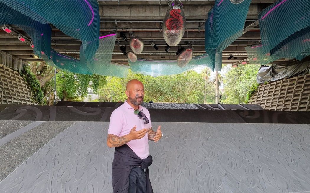 Artist Graham Tipene with his interactive art installation 'Waimahara', which is part of an $11 million facelift at Myers Park in central Auckland. Tipene says his piece represents the ancient river that still runs under the city.