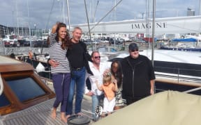 Mikhail Khimich with his girlfriend, Belarussian model Maria Dzidirava, and Kim Dotcom on Khimich's super yacht Thalia.