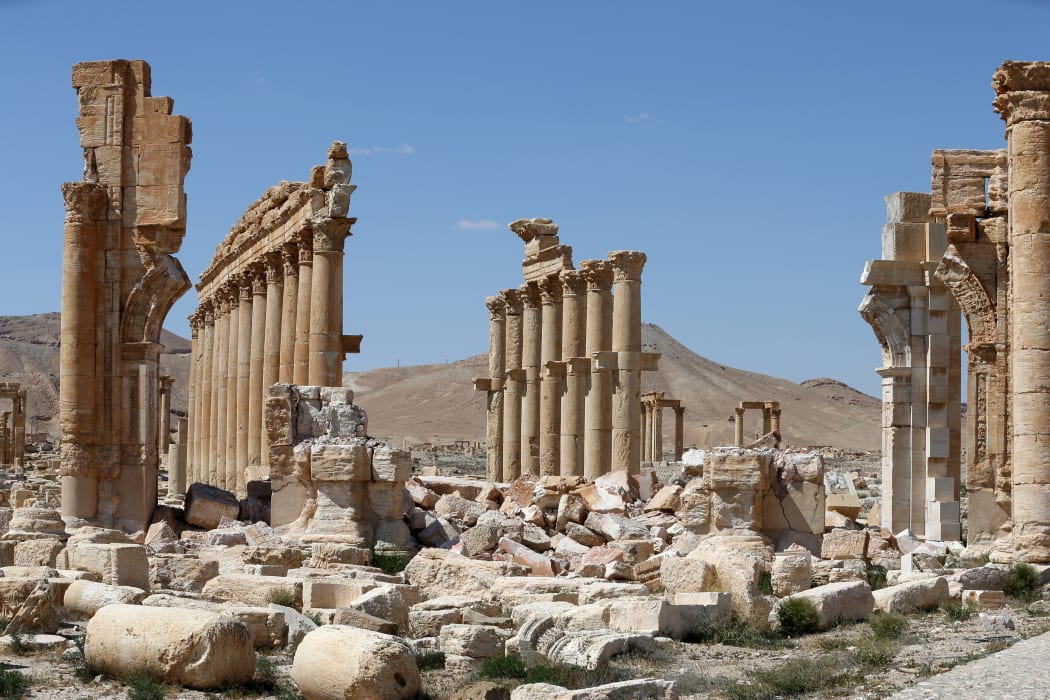 The remains of the Arch of Triumph in the ancient Syrian city of Palmyra after its recapture on 27 March 2016.