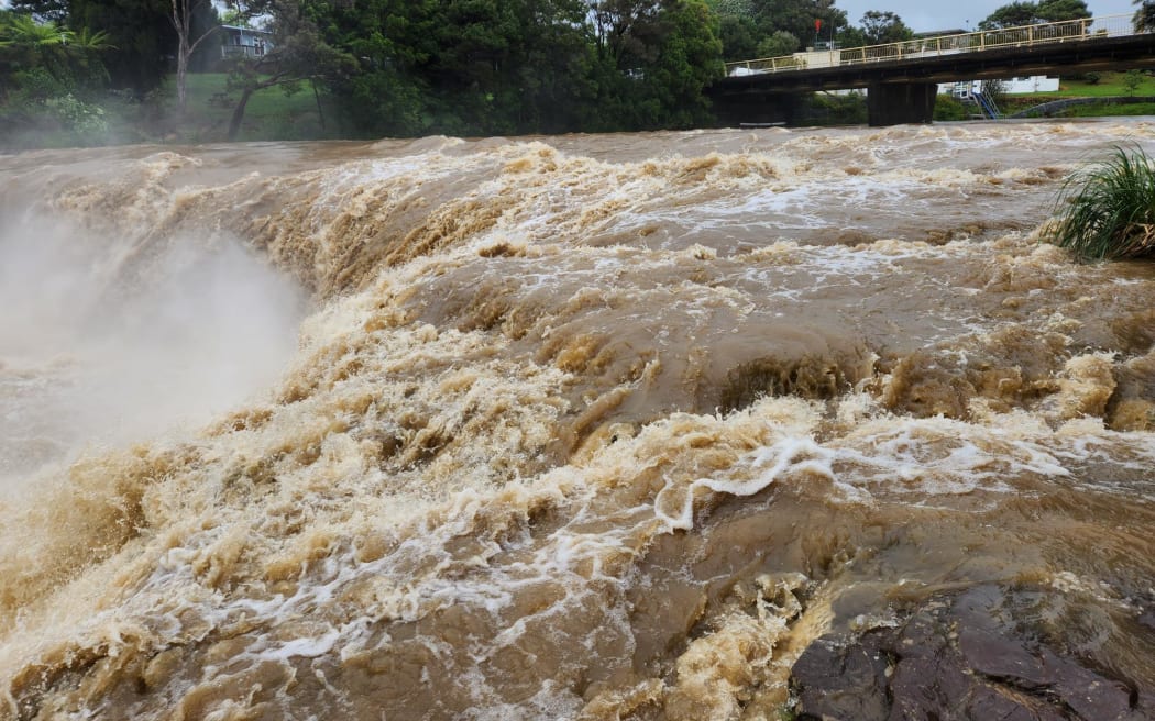 Floodwaters thunder over Haruru Falls, near Paihia in the Bay of Islands on 30 October, 2023.