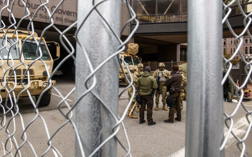 Law enforcement and National Guard members stage outside the Hennepin County Government Center on April 19, 2021 in Minneapolis, Minnesota.