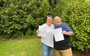 Michelle Shaw and Mic celebrate their permanent residency.