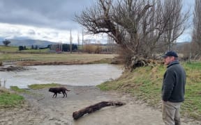 It wasn't the biggest flood Ron Sheat has seen at his Palmerston farm, standing at the Shag River.