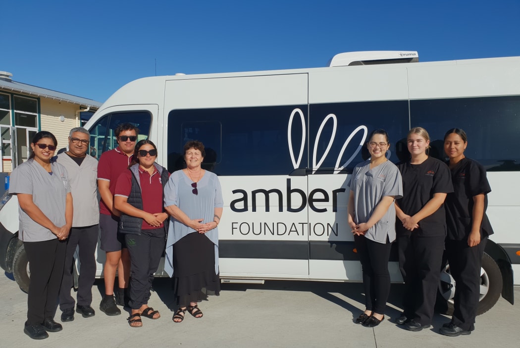 The new mobile dental clinic that will serve teenagers on the East Coast: from left, Dr Sujatha Mathew, Dr Nitish Surathu, students Reagan Mitchell and Miss Riva-Lee Habib, Tolaga Bay Area School principal Nori Parata, Victoria Lim, Sophie Goodson and Hinearihi Smith.