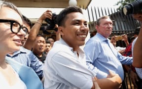Reuters journalist Kyaw Soe Oo reacts after being freed from Insein prison with colleague Wa Lone in a presidential amnesty in Yangon on May 7, 2019.