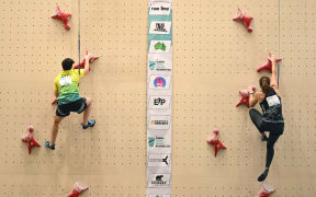 Grace Crowley of Australia (L) and Sarah Tetzlaff of New Zealand compete in the Speed Final of the International Federation of Sport Climbing (IFSC) Oceania qualifying event in Melbourne.