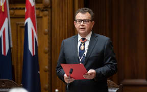 Secretary of the Cabinet and Clerk of the Executive Council Michael Webster reads the commission signed by the Queen, appointing Dame Cindy Kiro as Governor General